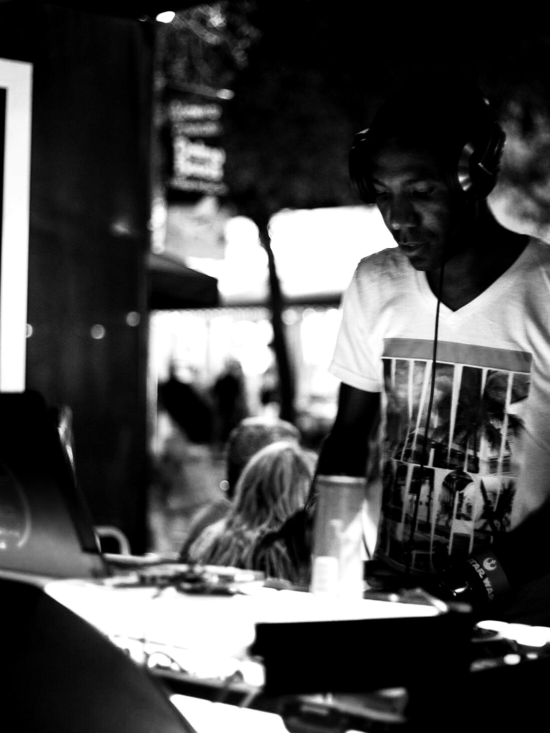 DJ Skinny Greg behind the decks at a South Florida venue